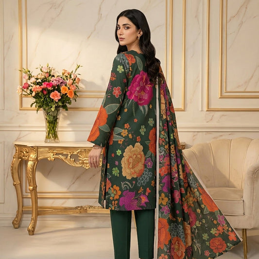 Woman in a floral dress standing in an elegant room with a table and flowers.