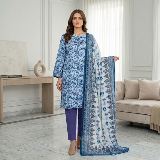 Woman holding a blue floral dupatta in a living room setting