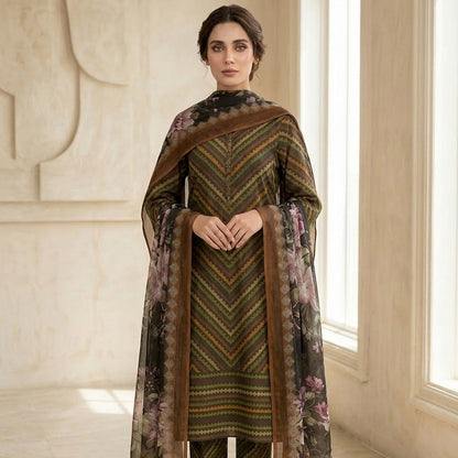 Woman wearing a traditional outfit with a patterned shawl in a well-lit room.