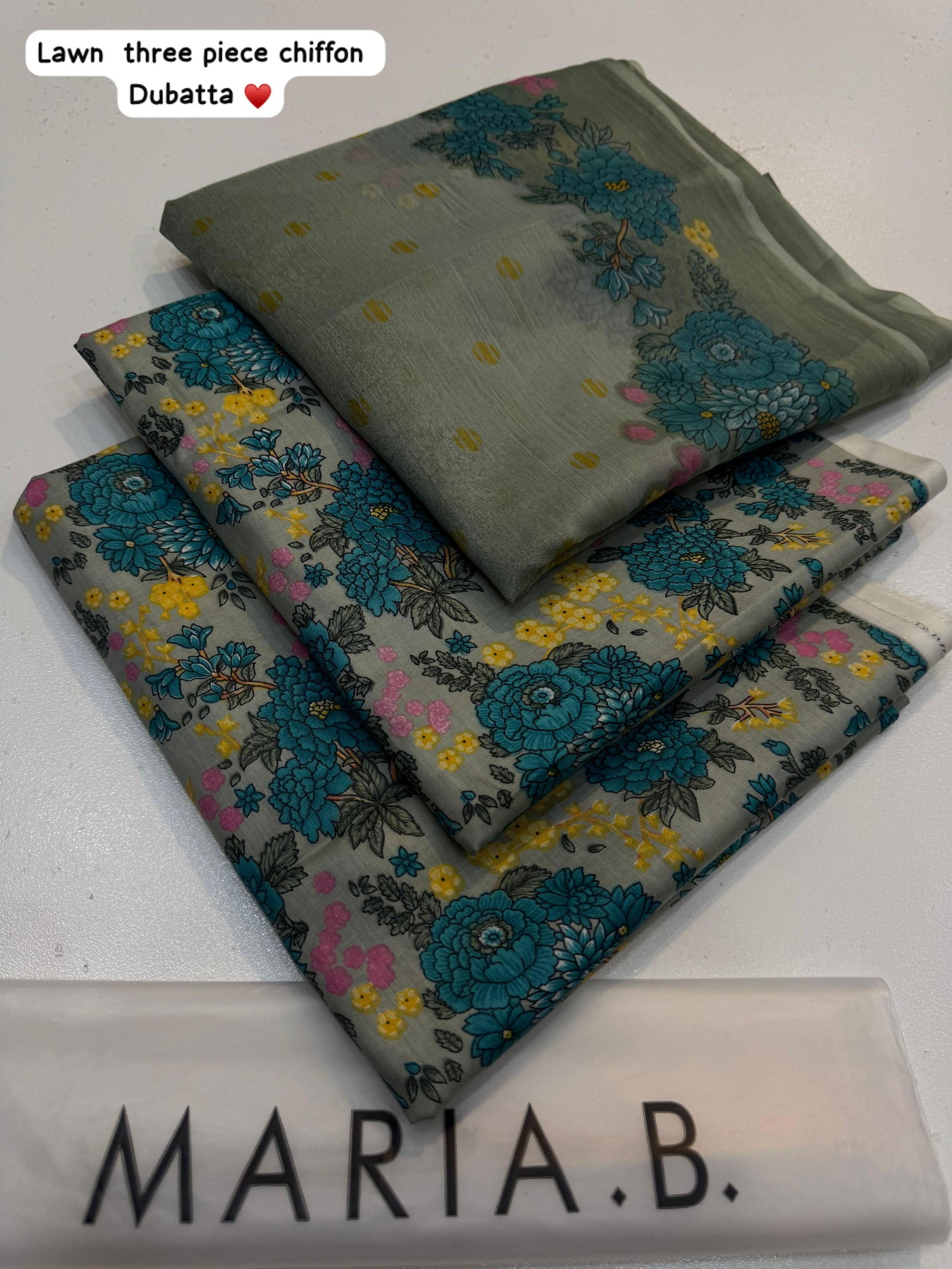 Floral-patterned dupatta with 'Maria B.' branding on a white background