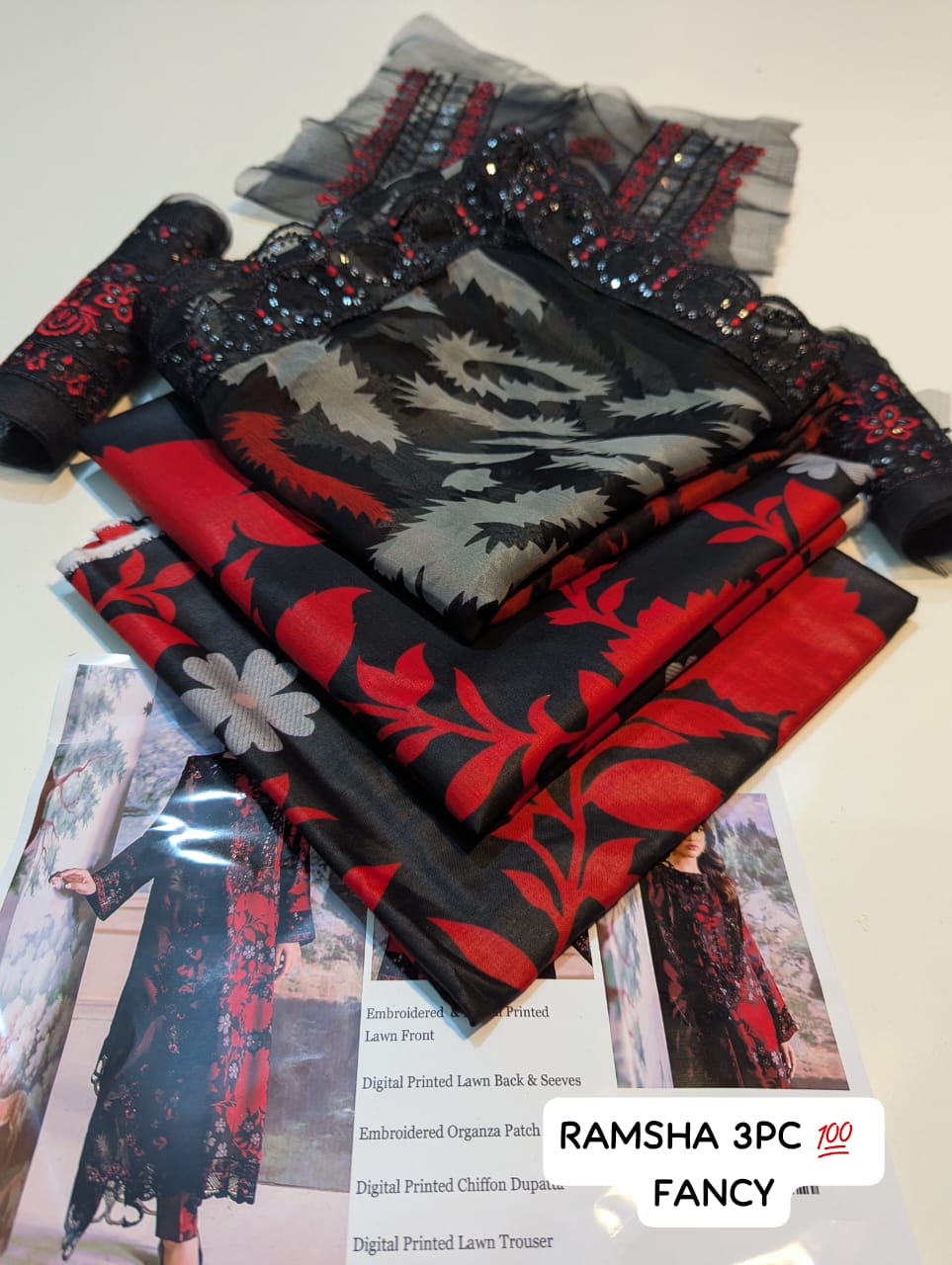 Collection of patterned fabrics with a visible brand logo on a white background